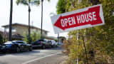 A sign advertising an open house in Corona Del Mar, California.
