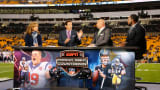 ESPN broadcasters talk on the set at Heinz Field before an NFL football game.