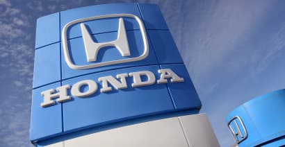 Honda cuts profit guidance