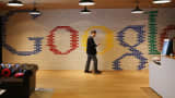 An employee walks through the lobby of Google's Washington, D.C., headquarters.