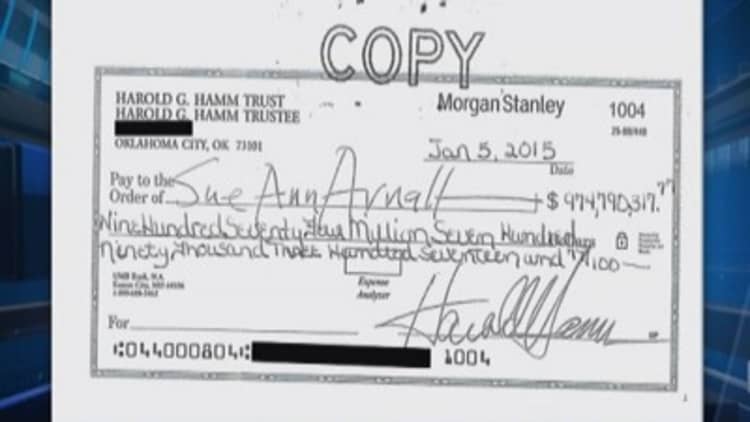 Hamm's ex-wife cashes $975 million check: Sources