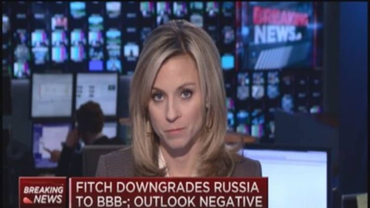 Fitch downgrades Russia to BBB-