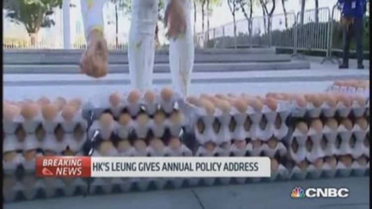 HK woman protests by smashing 1,000 eggs on herself