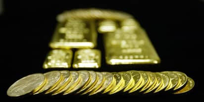 Spot gold extends losses after Fed announcement