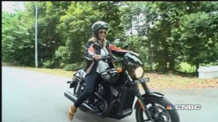 CNBC anchor takes a ride in a Harley Davidson