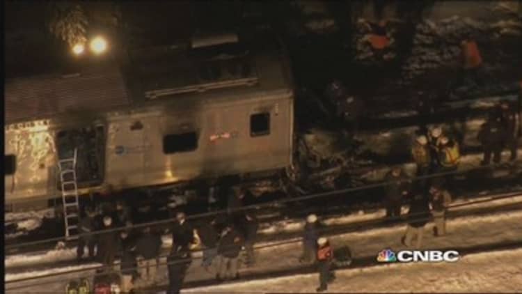 NYC train crashes into car, 7 dead