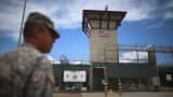 A military officer stands near the entrance to Camp VI at the U.S. military prison for 'enemy combatants' in Guantanamo Bay, Cuba.