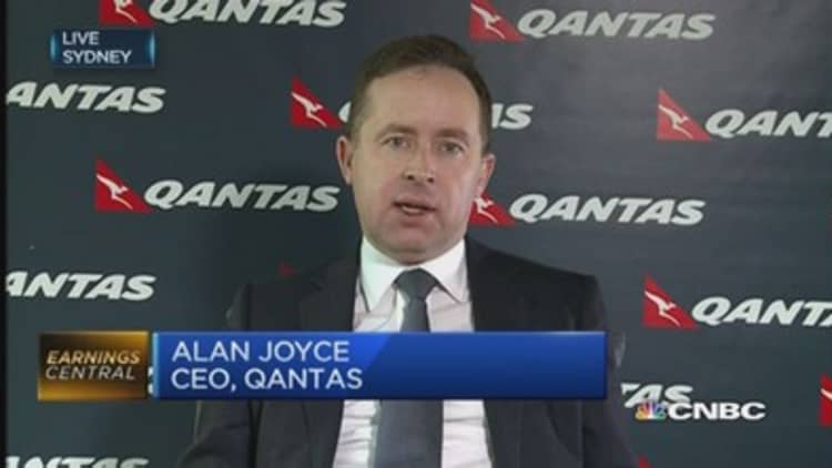 Qantas soars back to profitability