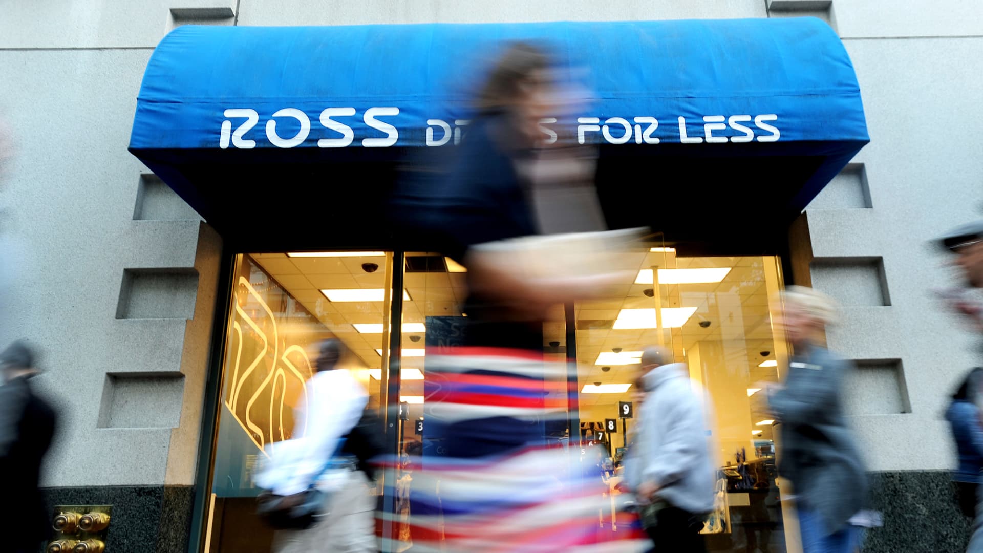 Pedestrians pass in front of a Ross Stores location in San Francisco.