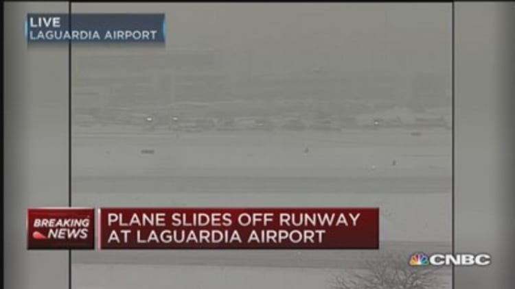 FAA to NBC: Plane slides off runway at LGA