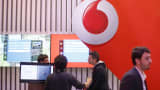 Attendees visit the Vodafone Group pavilion at the Mobile World Congress in Barcelona, Spain, March 4, 2015.