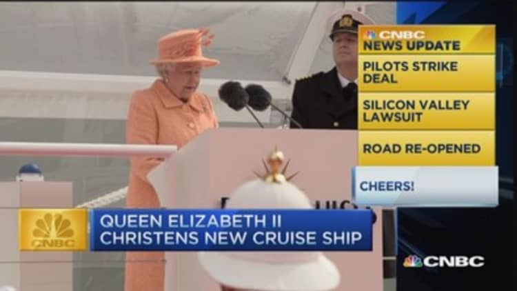 CNBC update: Queen christens cruise ship