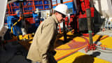 A worker with Apache in the Permian Basin in Mentone, Texas.