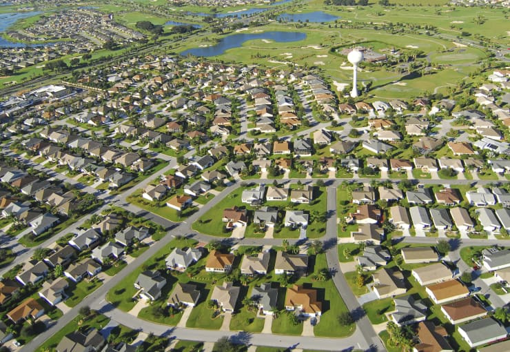Premium: Aerial view of new homes and golf course in The Villages, Florida.