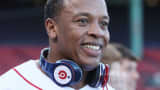 Dr. Dre with Beats by Dr. Dre headphones