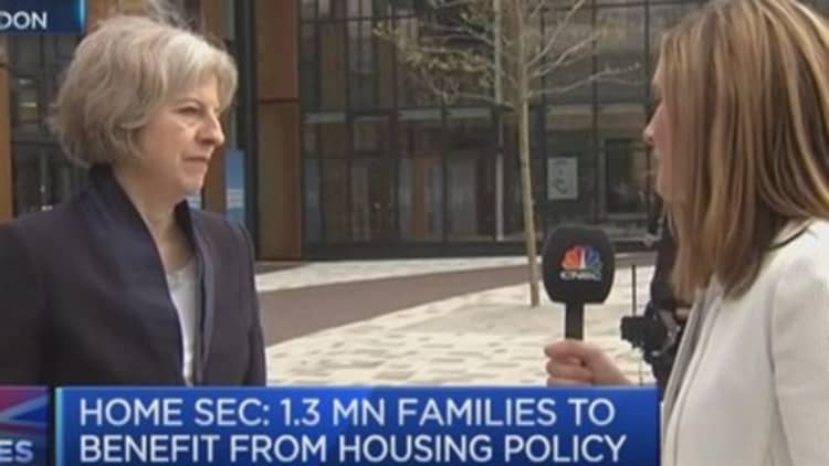 Theresa May defends right-to-buy scheme