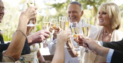 Here's how much wedding guests spend as inflation, interest rates are 'taking a toll'