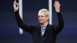 Apple CEO Tim Cook gestures on stage during an Apple special event in San Francisco, California