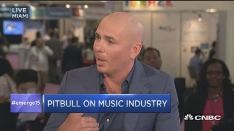 Pitbull: Music biz should have partnered with Steve Jobs