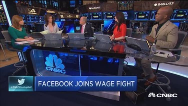 Facebook joins wage battle