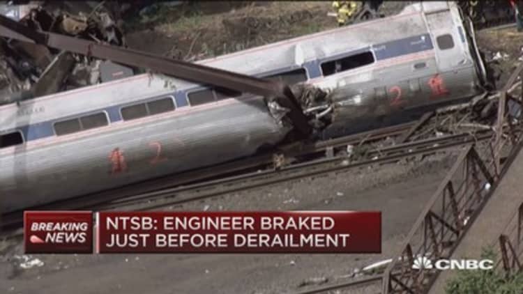 NTSB: Engineer hit brakes before derailment