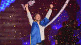 Mans Zelmerloew of Sweden reacts after winning on stage during the final of the Eurovision Song Contest 2015 on May 23, 2015 in Vienna, Austria.