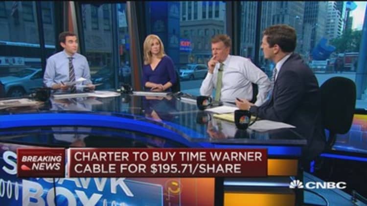 Charter to pay $100/share cash plus 0.54 shares