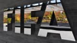 The FIFA logo is seen outside the FIFA headquarters in Zurich, Switzerland.