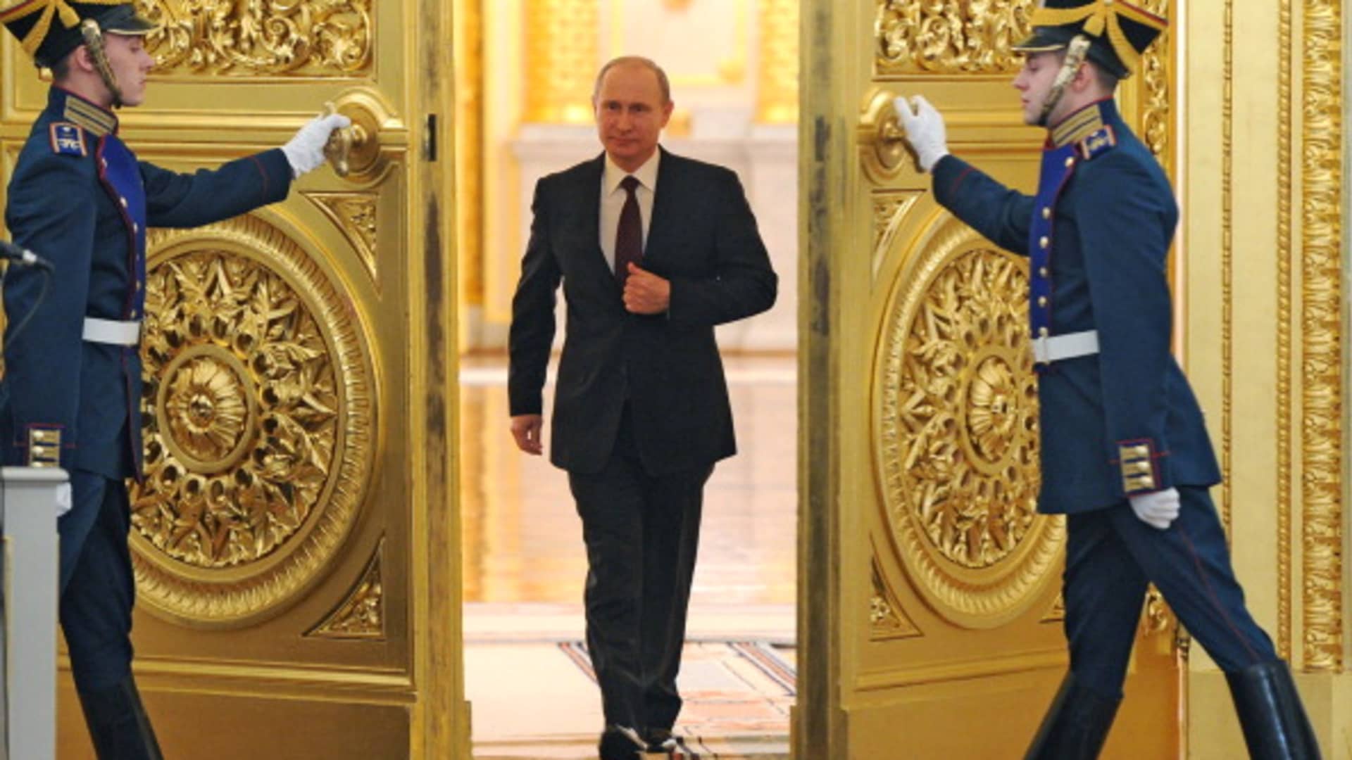Russian President Vladimir Putin enters the St. George Hall at the Grand Kremlin Palace in Moscow.