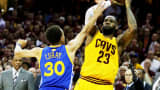 LeBron James of the Cleveland Cavaliers shoots against Stephen Curry of the Golden State Warriors during Game Three of the 2015 NBA Finals on June 9, 2015 in Cleveland.
