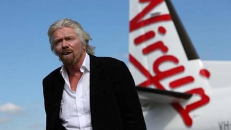 Richard Branson gives dads paid leave for a year