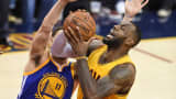 LeBron James of the Cleveland Cavaliers drives against Klay Thompson of the Golden State Warriors during Game 3 of the 2015 NBA Finals on June 9, 2015, in Cleveland.