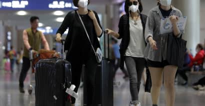 South Korea protests Japan's travel curbs as coronavirus ignites diplomatic row