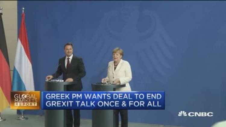 European markets close: Merkel determined on Greek deal
