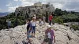 Tourists visit Acropolis Hill in Athens, June 23, 2015.