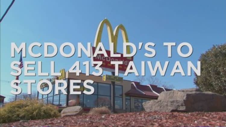 McDonald's trims costs globally