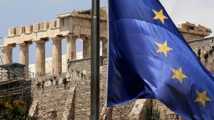 Global leaders urge Greece to strike deal