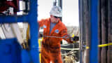 An operator for Baker Hughes conducts a wireline survey on a Chesapeake Energy natural gas rig in the North Texas Barnett Shale near Burleson, Texas.