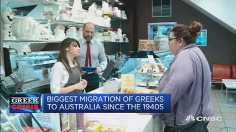Amid endless drama, Greeks flock to Australia