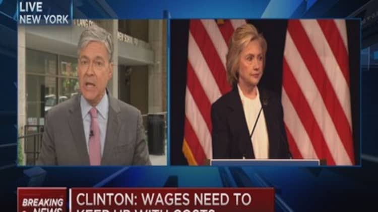Clinton: Wages need to keep up with costs 