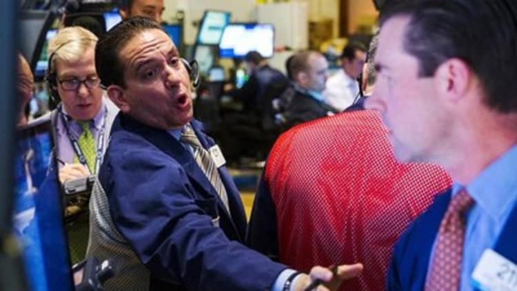 Wall Street awaits Fed, snaps losing streak