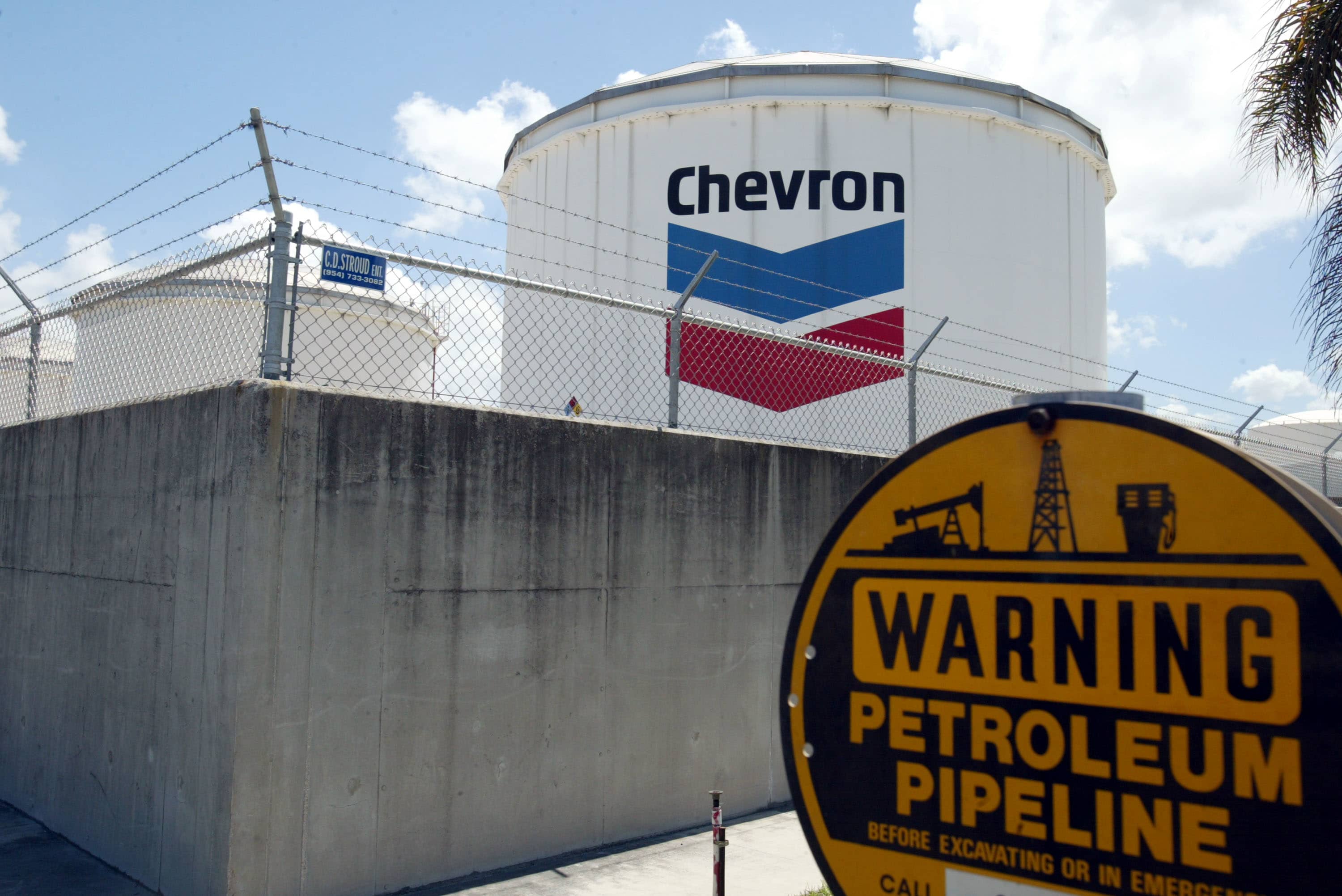Chevron shares fall after oil giant reports an $8.3 billion loss for second quarter - CNBC