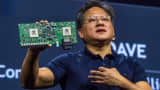 Jen-Hsun Huang, CEO of Nvidia, holds a Nvidia Drive PX Auto-Pilot Computer during the GPU Technology Conference in San Jose, California, last March.