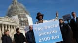 Maya Rockeymoore, president of the Center for Global Policy Solutions, speaks as House Democrats hold a news conference to announce the introduction of Social Security 2100 Act in front of the U.S. capitol building in Washington, D.C.