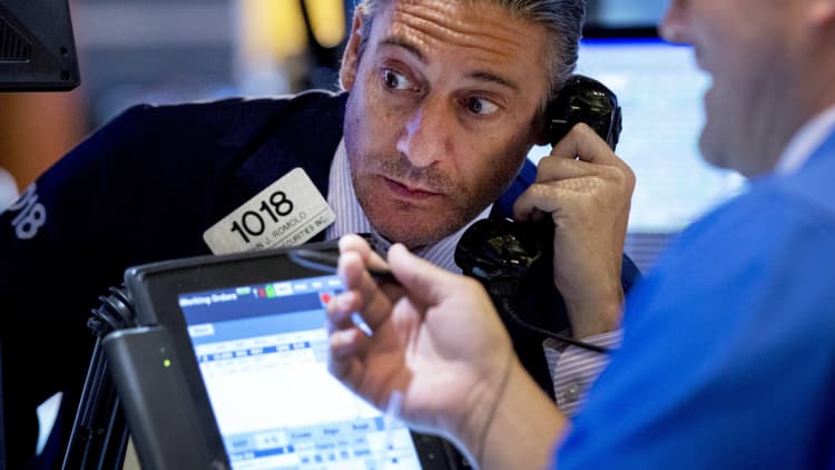 Stocks near session lows on China woes