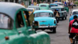 Old American cars fill the streets of Havana, Cuba.
