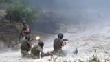 Ukrainian servicemen take part in military exercises on the shooting range of Ukrainian forces near Ghytomyr, some 150 km west of Kiev.