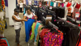Customers browse clothing at a J.C. Penney store in Brooklyn, New York.