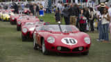 Ferrari automobiles line up to exit the concourse during the 2014 Pebble Beach Concours d'Elegance in Pebble Beach, California, U.S., on Sunday, Aug. 17, 2014.