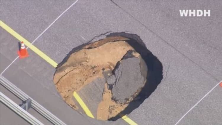 Sinkhole emerges on New Hampshire highway